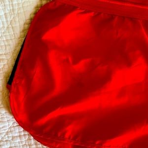 Red Nike shorts